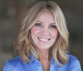 A Mature business woman smiling at the camera