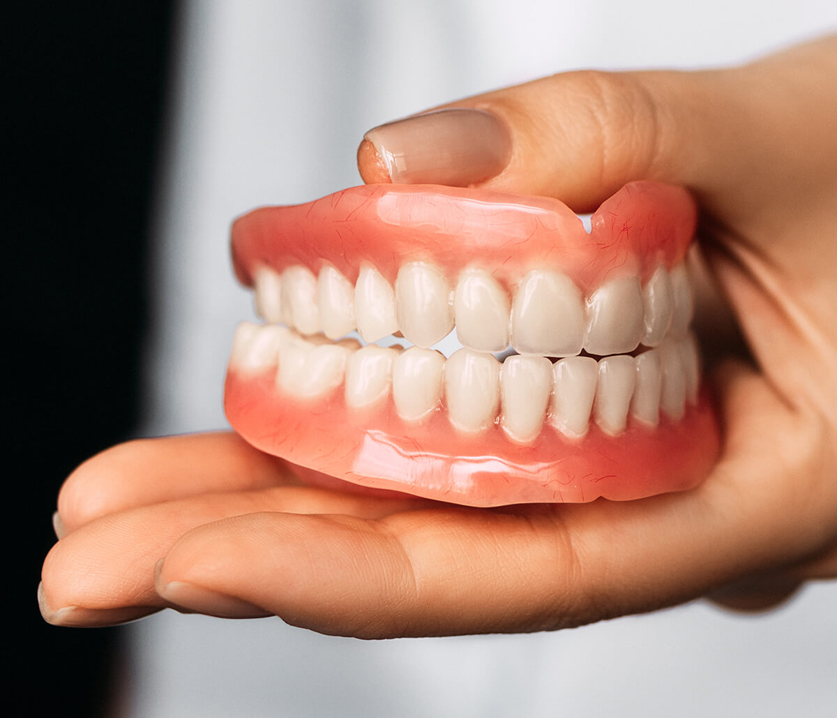 Custom dentures are indistinguishable from healthy, natural teeth in every way