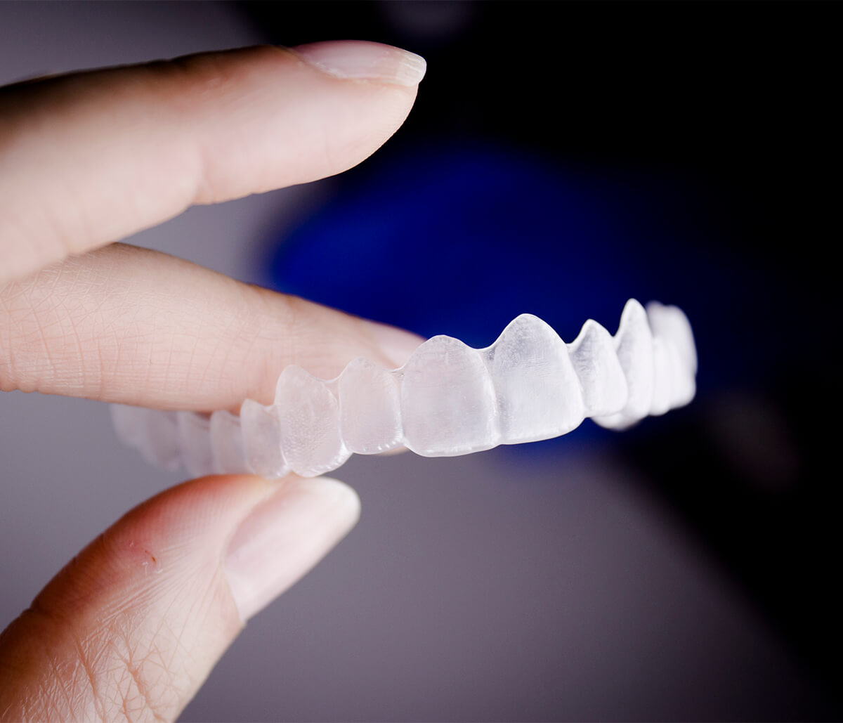 Comfortable, removable, and discreet Invisalign® treatment to straighten teeth